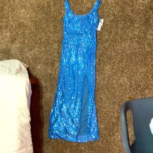 Brand new Blue sequin dress with slit
